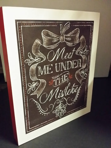 Meet me Under The Mistletoe...